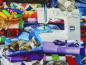 Preview: Patchworkstoff mit Nähmaschine als Motiv bunt
